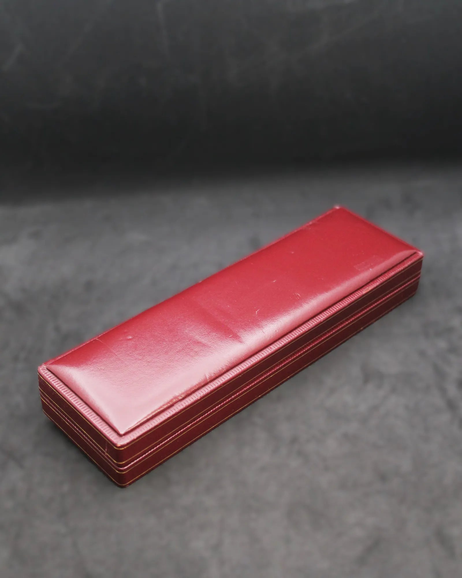 Vintage Longines Red Slender Clamshell Watch Box with Iconic Oval Logo – (ca. 1957-1965)
