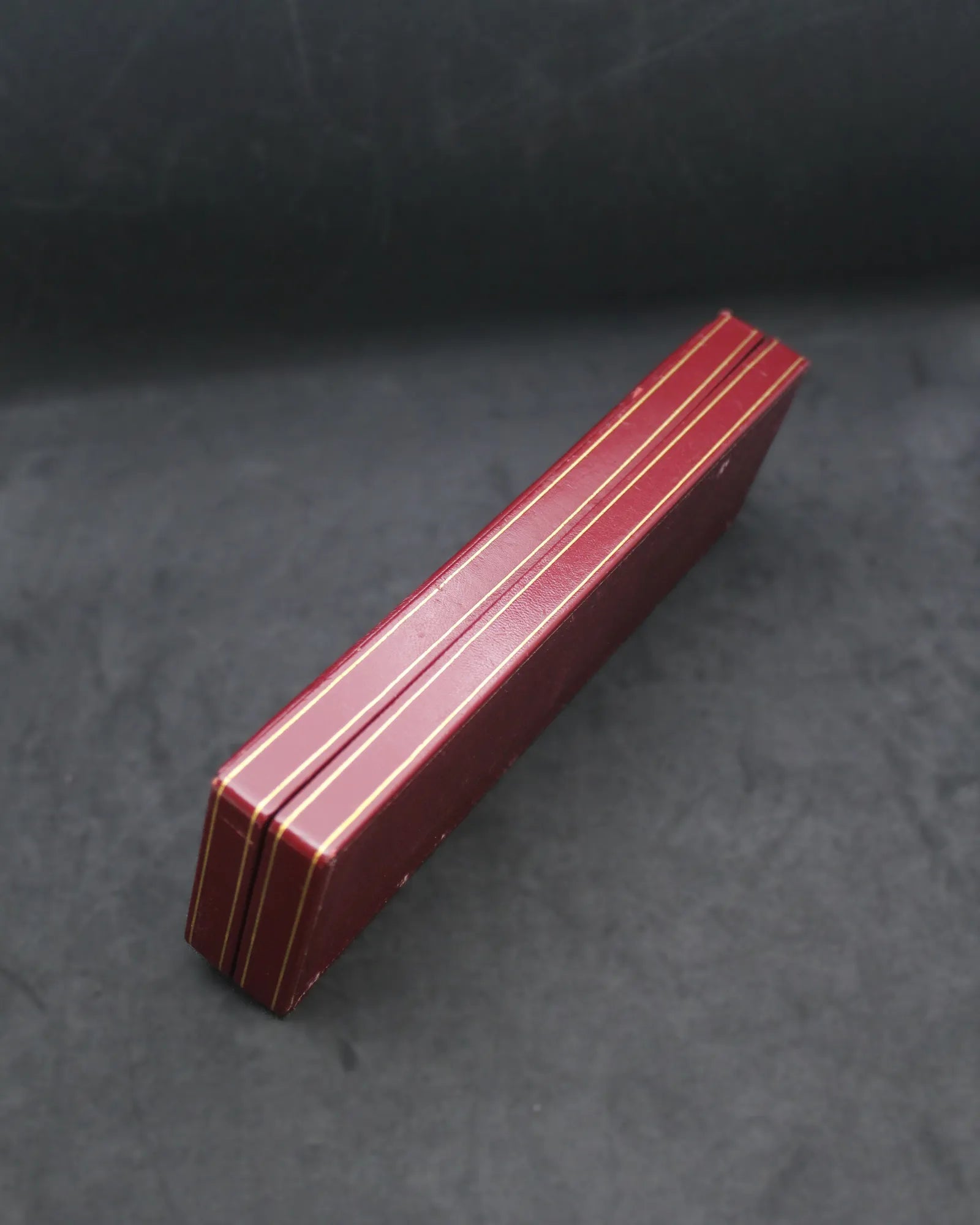 Vintage Longines Red Slender Clamshell Watch Box with Iconic Oval Logo – (ca. 1957-1965)