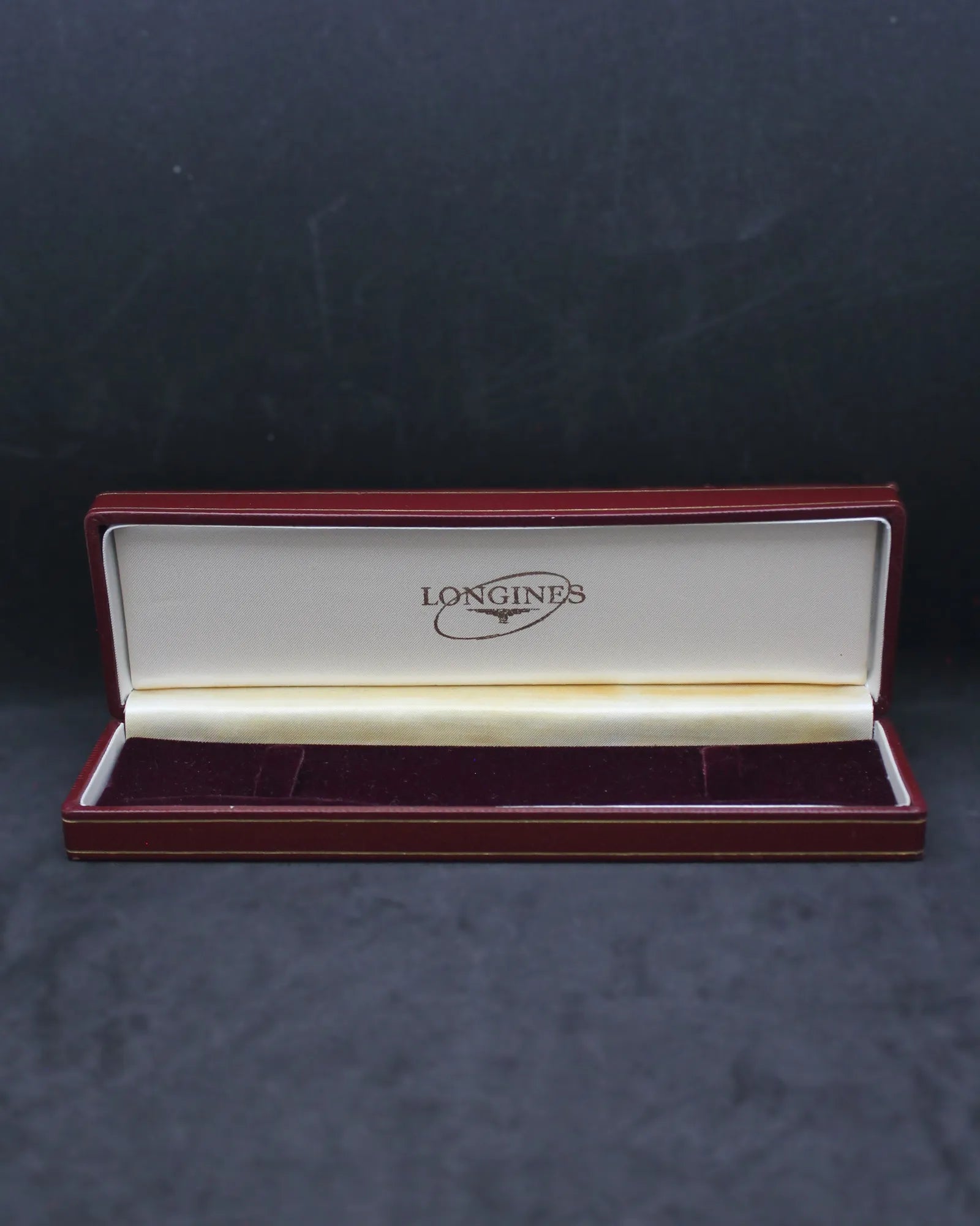 Vintage Longines Red Slender Clamshell Watch Box with Iconic Oval Logo – (ca. 1957-1965)
